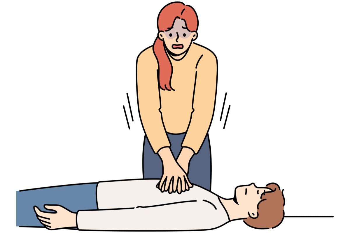 person doing CPR on a person person doing CPR on a person